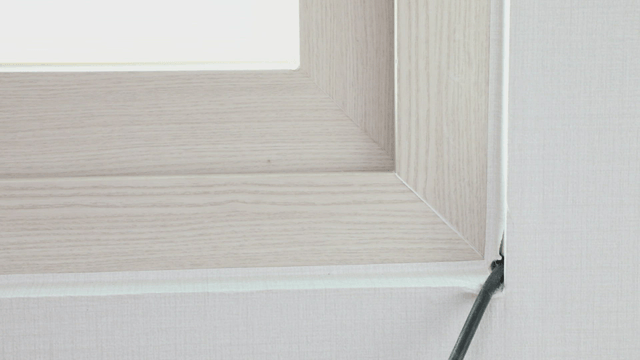 Clean window frame with cables passing through it