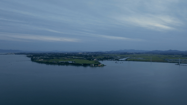 Serene coastal landscape at evening