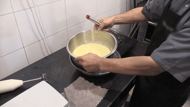 Baker cooling cream over ice