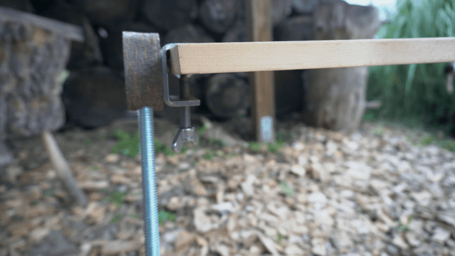 Handcrafted wooden bench with metal supports