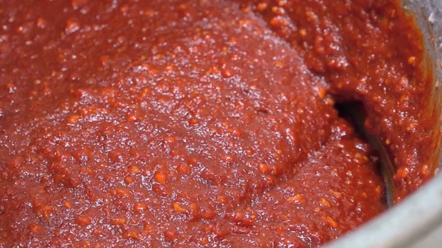 Red chili paste in a metal bowl