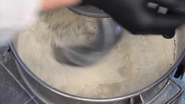 Large mixer kneading flour and ingredients