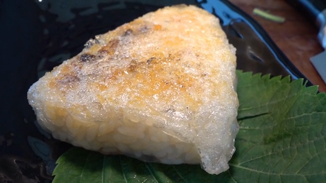 Grilled rice balls on a plate