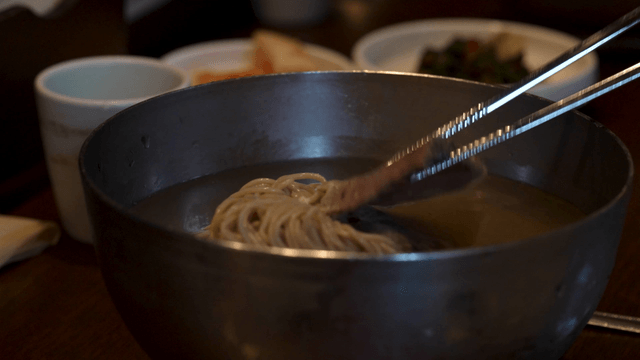 Buckwheat noodles topped with egg and beef