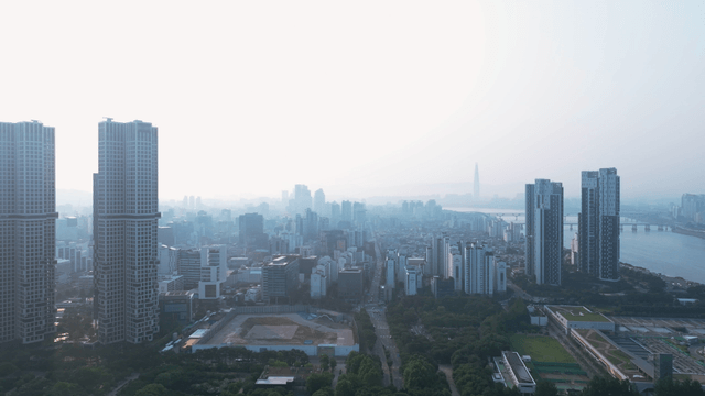 Seoul cityscape with tall buildings by the Han River