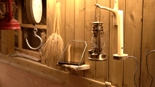 Vintage interior wall with handcrafted wooden phone shelf