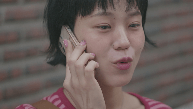 Woman talking on the phone outdoors