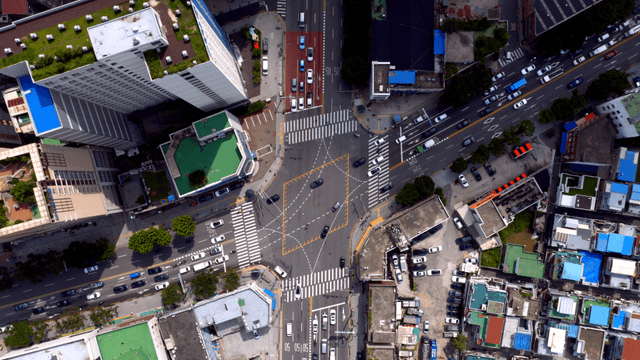 A busy city intersection with traffic