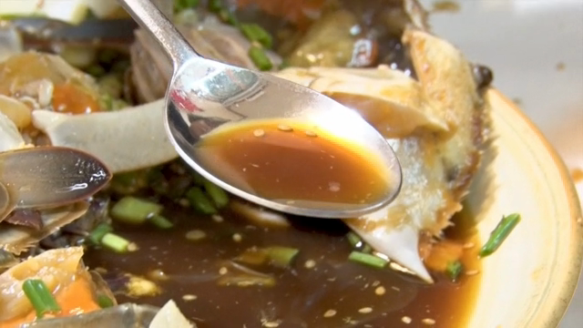 A spoonful of soy sauce from Soy Sauce Marinated Crab
