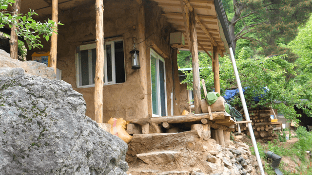 Rustic farmhouse with stone steps