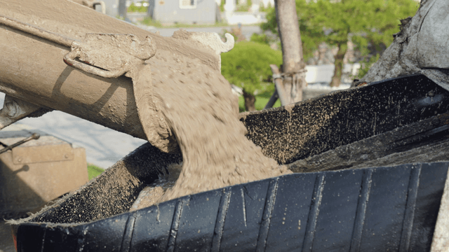 Concrete pouring from a mixer