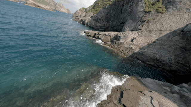 Rocky coastline with clear blue sea