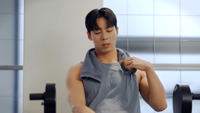 Man exercising in a gym with equipment