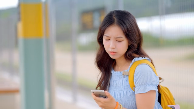Woman displeased with travel photos