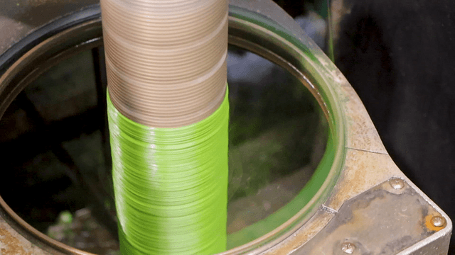 Textile machine rapidly winding green threads