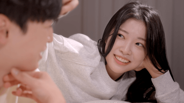 Couple lying comfortably and talking together