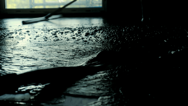 Concrete being poured on a floor