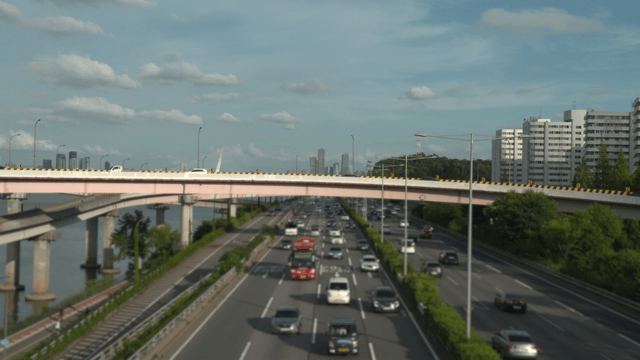Bridge connecting city over busy highway