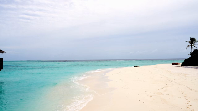 A serene beach with turquoise waters