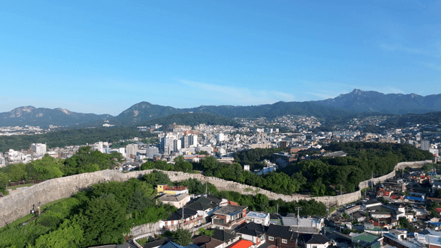 Cityscape with mountains in the background