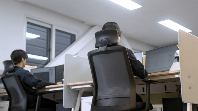 Office workers focused on their tasks