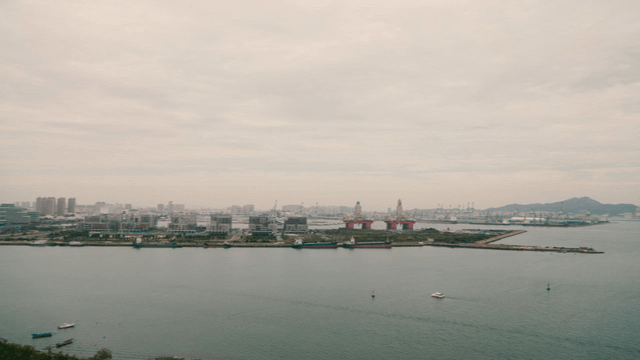 Vast city landscape overlooking a harbor