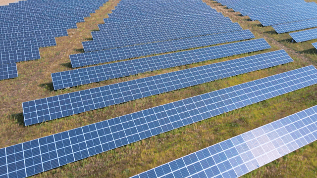 Solar panels installed across wide field
