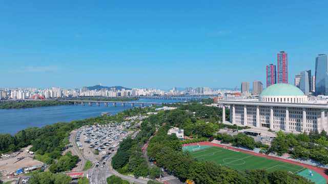 Cityscape with river and modern buildings