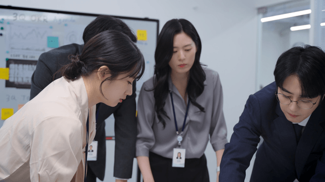 Team discussing a project in an office