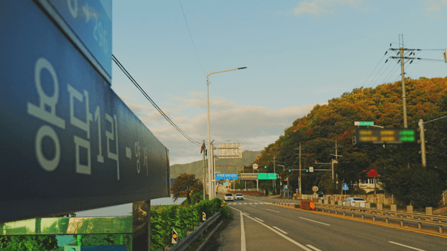 Quiet road with autumn foliage