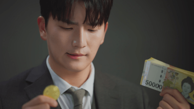 Man comparing bitcoin and Korean won