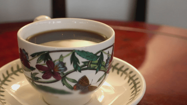 A cup of coffee on a table