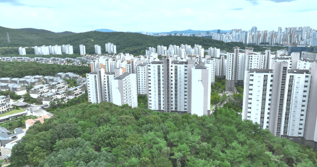 Apartment and residential complex surrounded by trees