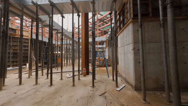 Construction site with metal beams and scaffolding