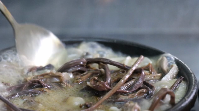 Sundae soup with bracken fern boiling in a hot pot
