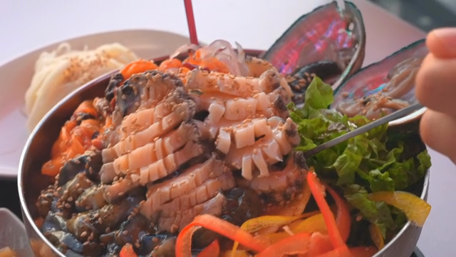 Fresh seafood bibimbap with vegetables
