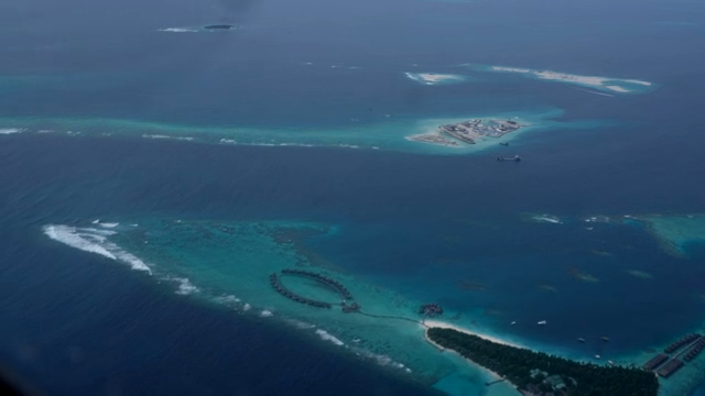 Tropical islands surrounded by blue ocean