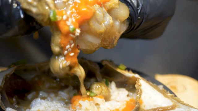 Soy Sauce Marinated Crab with rice and sesame seeds