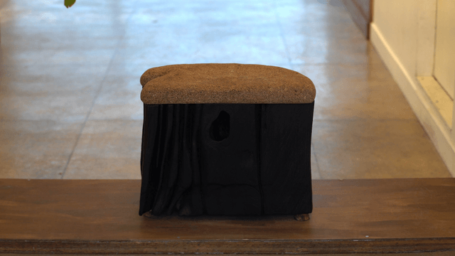 Unique wooden chair in corridor