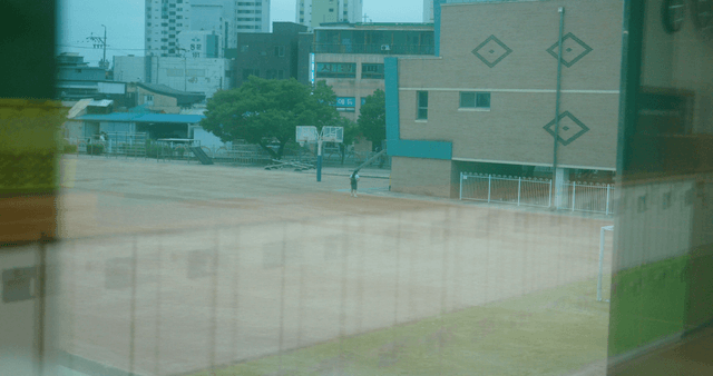 Schoolyard with students in the afternoon