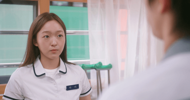 Students in a classroom having a conversation