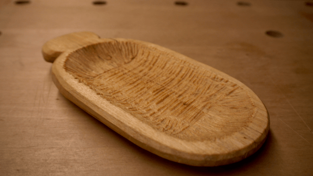 Wooden dish on a wooden table