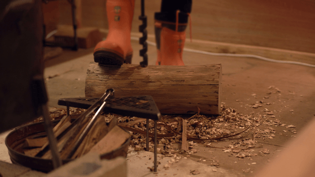 Woodworking with tools and wood shavings