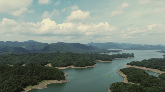 Vast lake surrounded by lush mountains