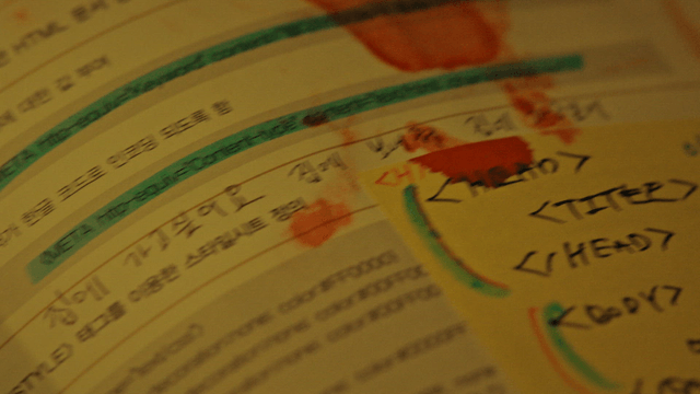 Blood and rescue request message on a book