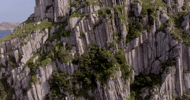 Rocky cliffs with green vegetation