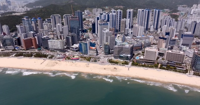 A bustling cityscape by the beach