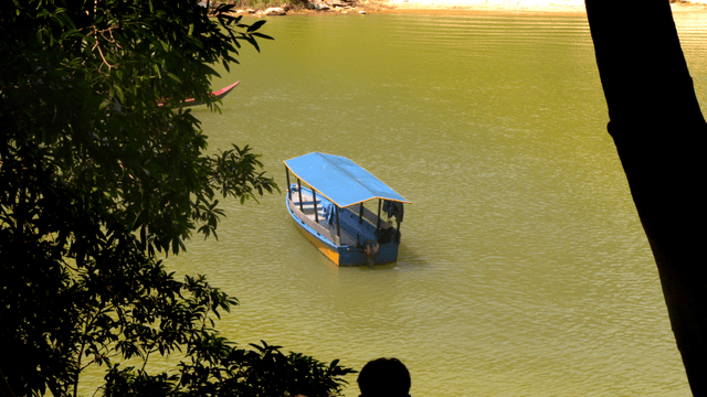A boat floating on a calm lake