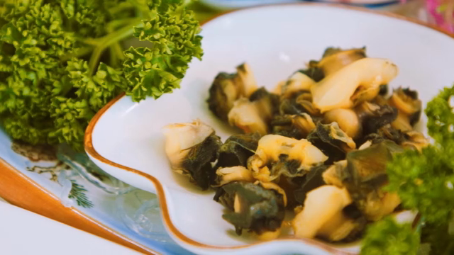 Parboiled conch on a plate