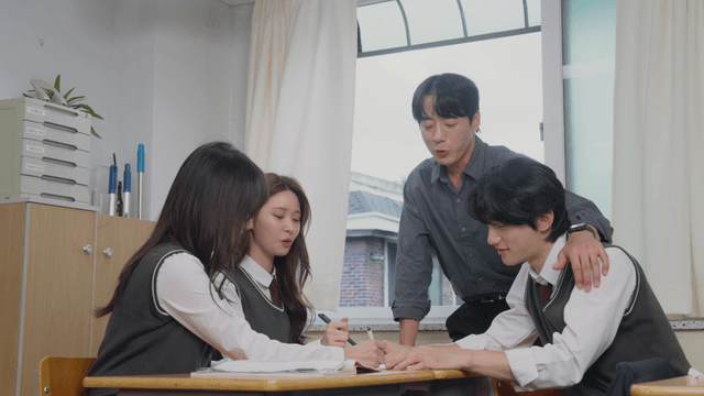 Teacher and students chatting together
